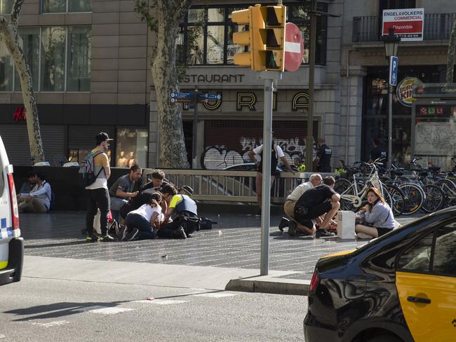 Chaotic scenes after a car mowed down pedestrians in Barcelona’s Las Ramblas district. PictureNicolas Carvalho Ochoa/AFP