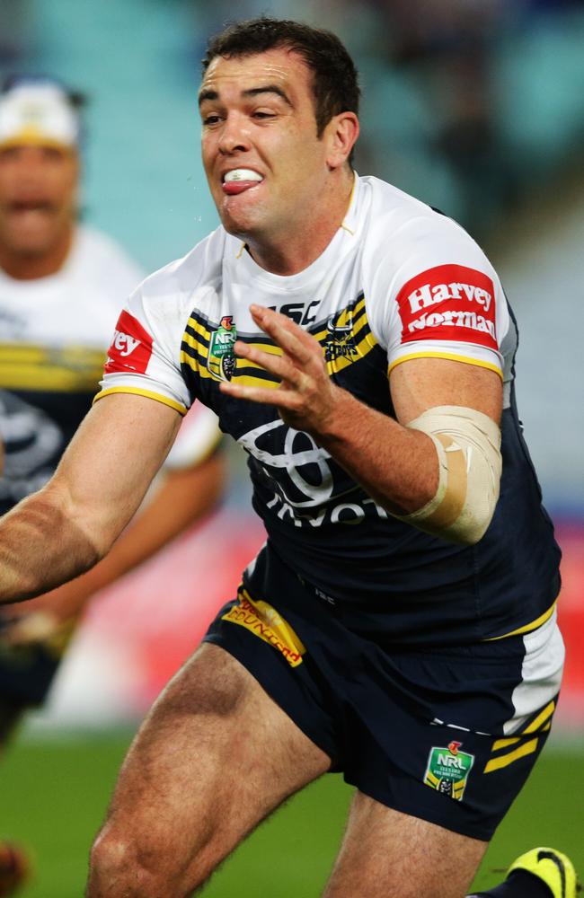 Cowboy's Kane Linnett offloads the ball.