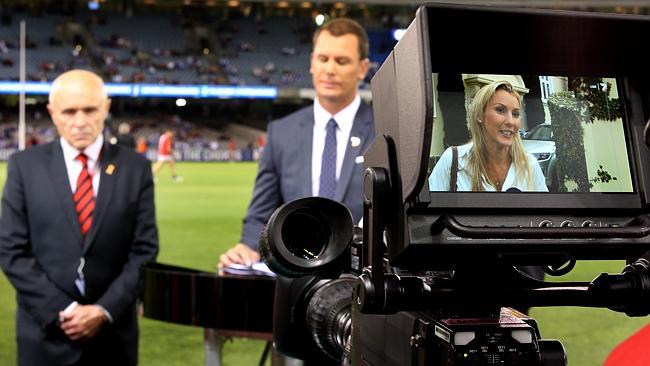 Essendon president Paul Little listens to Tania Hird had to say on ABC’s 7.30. Picture: Wayne Ludbey