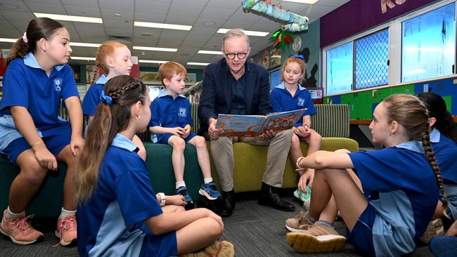 DARWIN, AUSTRALIA. MARCH 13, 2024. Australian Prime Minister Anthony Albanese reads a book together with students after attending a school assembly at Stuart Park Primary in Darwin, NT, Wednesday, March 13, 2024. PICTURE: Lukas Coch/ Pool/ NCA NewsWire