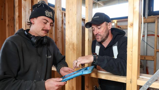 Builder Chris Langford with his apprentice Ben. Picture: Russell Millard