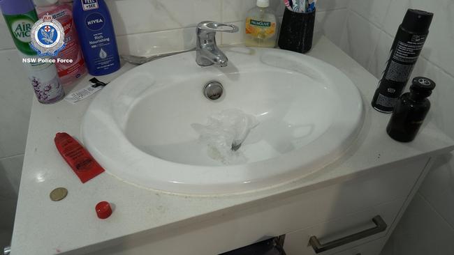 Prohibited drugs were found stashed in a sink at one of the properties. Picture: NSW Police