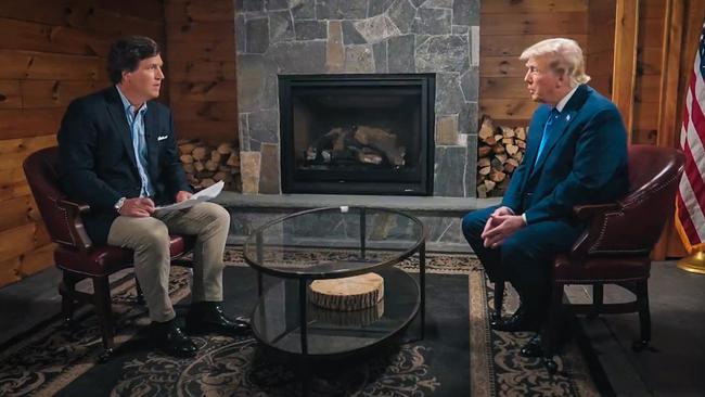 Tucker Carlson interviews Donald Trump at the former president’s Bedminster golf club in New Jersey. Picture: X