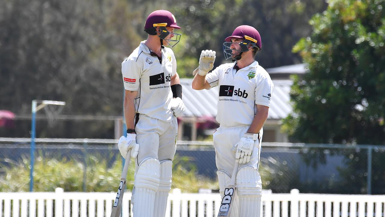 Ipswich batsmen Jack Wood and Dan Wilson meet in the middle after the over., John Gass