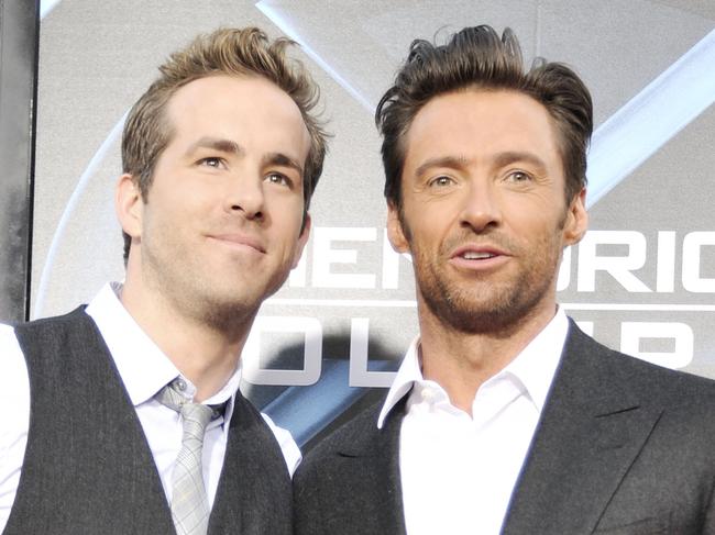 LOS ANGELES, CA - APRIL 28:  Actors Ryan Reynolds (L) and Hugh Jackman arrive at the screening 20th Century Fox's 