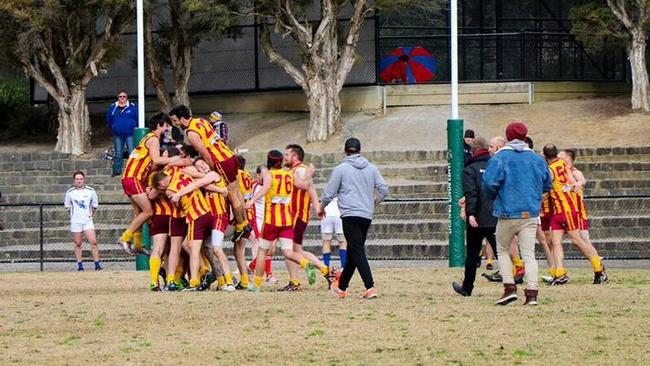 Nunawading's reserves team last year celebrates it’s first win in two years. Picture: Supplied