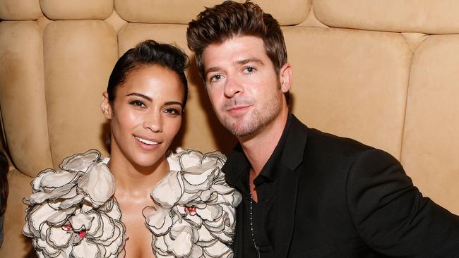 NEW YORK - SEPTEMBER 16: Actress Paula Patton (L) and singer Robin Thicke (R) attend The New York Times Style Magazine 5th anniversary issue celebration at The Standard on September 16, 2009 in New York City. (Photo by Amy Sussman/Getty Images)