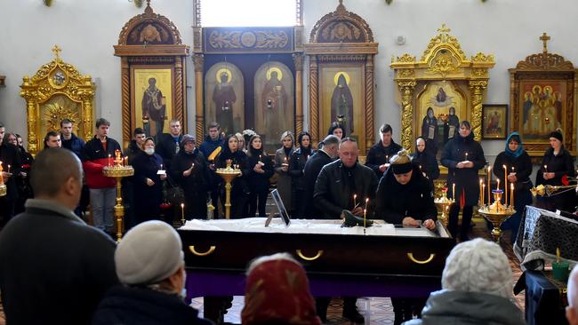 Mourners attend the funeral service for 20 year-old Russian serviceman Nikita Avrov, at a church in in Luga, after his death during the ongoing Russian invasion of Ukraine. Picture: AFP