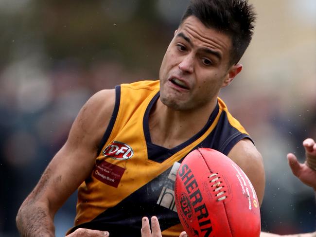 Athan Tsialtas of Strathmore attempts to mark during the EDFL Semi Final match between Strathmore and Pascoe Vale played at Coburg City Oval on Sunday 8th September, 2019.