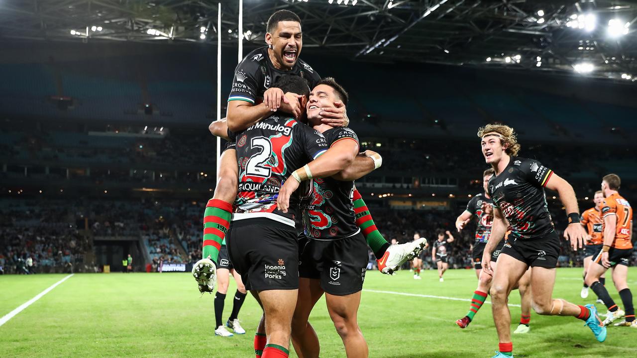 Alex Johnston (No.2) was swamped by teammates after breaking the record. Picture: NRL Photos