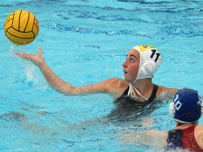 Under 19 Australian Water Polo Championships - Saskia Dunn of the Youth Barbarians under pressure from Nicolette Miller of South Australia on Saturday, December 10, 2022 in St Kilda East, Victoria, Australia.