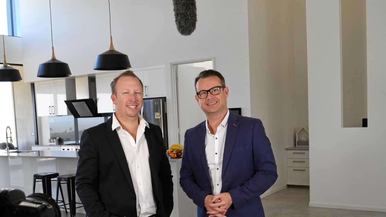 HAPPIER TIMES: Yeppoon builder Glen Finning and host of Australia&#39;s Best House&#39;s Gary Takle stand in Glen&#39;s two story house that will be featured on Gary&#39;s Build Me A Home television show on Foxtel Lifestyle in 2015. Picture: Madeline McDonald