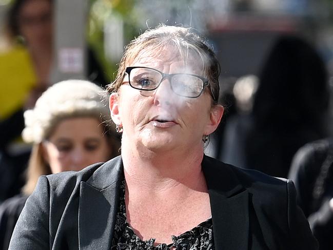 SYDNEY, AUSTRALIA - NewsWire Photos APRIL, 26, 2021: Libby Baker is seen arriving at the Downing Centre Courts in Sydney. Libby Baker has been charged with manslaughter after the death of her husband who had cancer, with police allegeing he died as a result of lack of care. Picture: NCA NewsWire/Bianca De Marchi