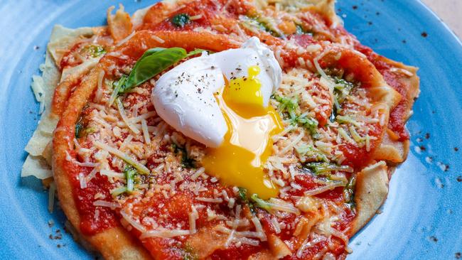 The Pane Frattau is a Sardinian flat bread dish with tomato salsa, basil, lamb broth, pecorino sardo and a poached duck egg. Picture: Tim Marsden