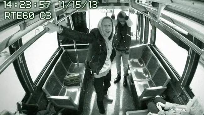 Macklemore and Ryan Lewis delighted commuters with an impromptu bus gig.