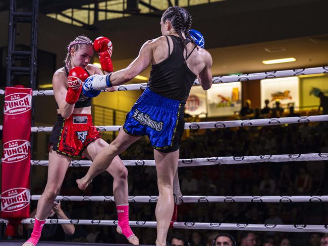 Taleisha Kirk (red) vs Claire Russell (blue) at the NT Fight Series XI at Ventia Stadium. Picture: Pema Tamang Pakhrin