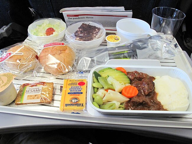 <p>Scandinavian Airlines served up a treat for one traveller. "It was a pretty good offering of beef with pretty good vegetables, mashed potatoes, lettuce salad (with tomato), two rolls of bread, butters, sesame crackers with Tillamook cheese, and a chocolate cake with raspberry filling for dessert." / Flickr user Brianholsclaw</p>