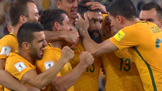 Mile Jedinak freekick leads to Australia's opener.