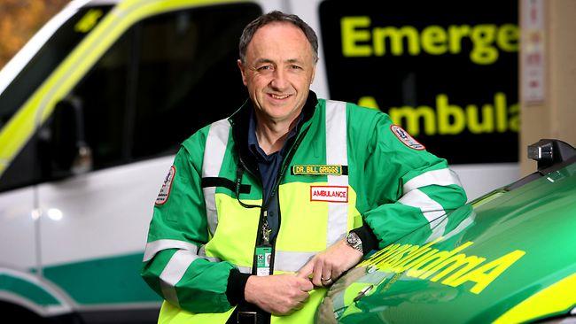 Dr Bill Griggs, standing near emergency vehicles. Picture: Matt Turner