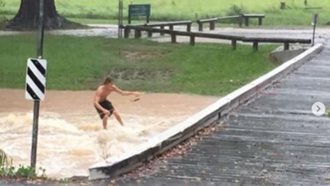 A young boy ‘surfing’ in Currumbin Creek. Picture: Instagram/@givemehops