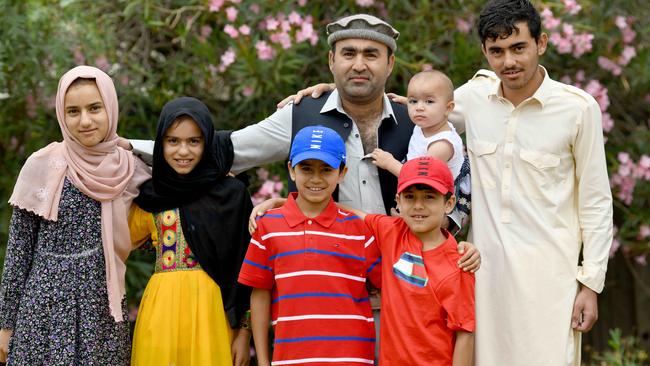 Noor Wali Jan Babaker Khail, who migrated to Australia from Afghanistan, and his children Mashita, 13, Nabeela, 11, Inamullah, 9, Omer Ullah, 8, Zainab, 12 months and Jaheedullah, 15, will become Australian citizens. Picture: Naomi Jellicoe