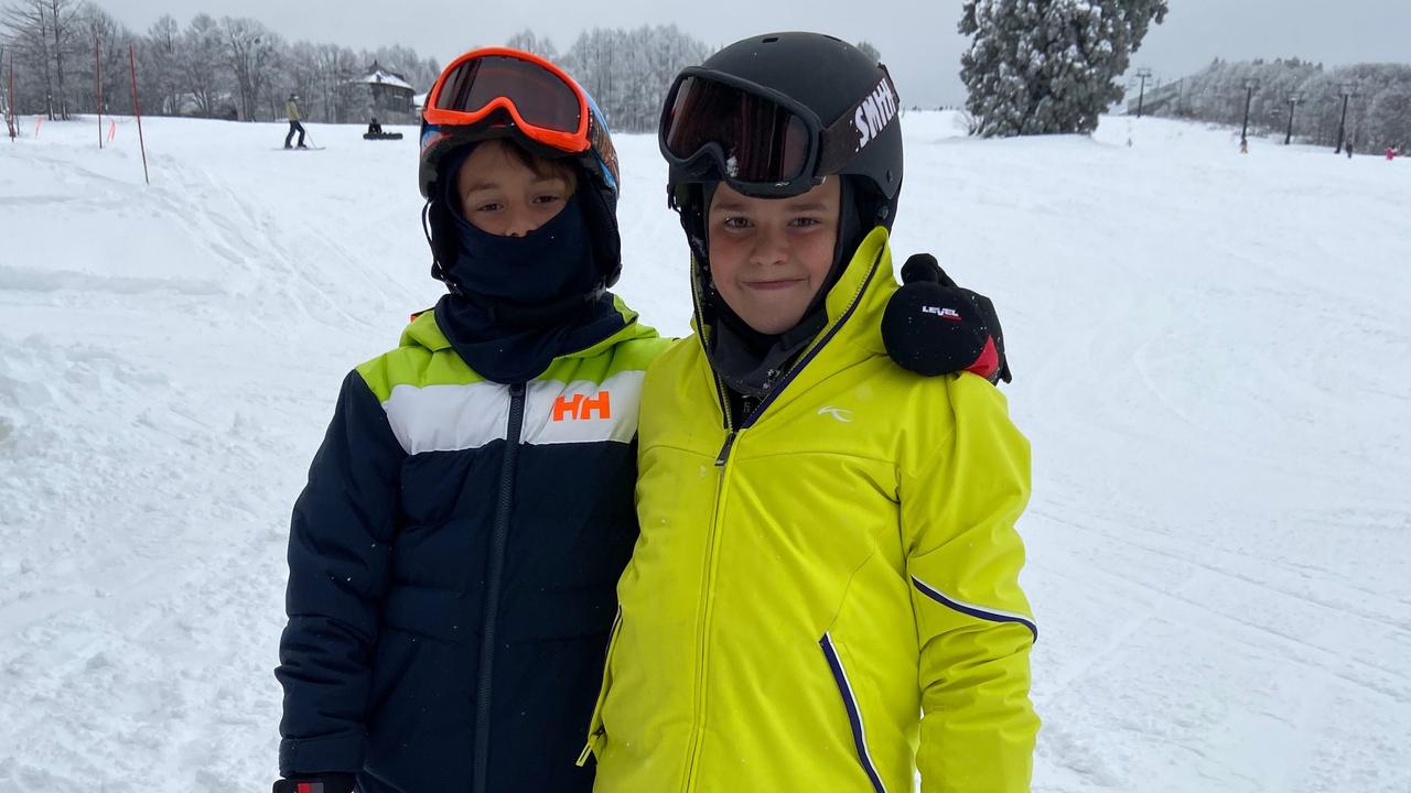 Jarvis Smoker, 12, (right) with brother Austin, 11. Jarvis hopes to represent Australia in snowboarding at the 2026 Winter Paralympics in Italy. Picture: supplied.
