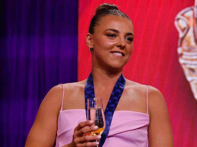 MELBOURNE, AUSTRALIA - NOVEMBER 25: Ebony Marinoff, Co-Captain of the Crows is seen on stage after  winning the AFLW Best and Fairest award during the 2024 W Awards at Crown Palladium on November 25, 2024 in Melbourne, Australia. (Photo by Dylan Burns/AFL Photos via Getty Images)