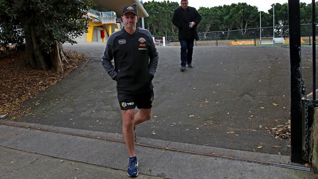 Despite the speculation, Michael Maguire insists he is committed to Wests Tigers. Picture: Toby Zerna