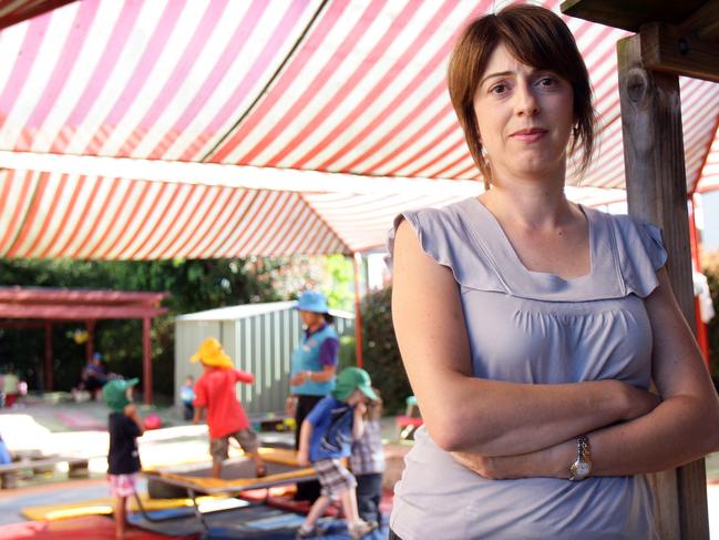 director of Kids World Kindy in Guildford West, Lienna Mandic with kids at the centre.