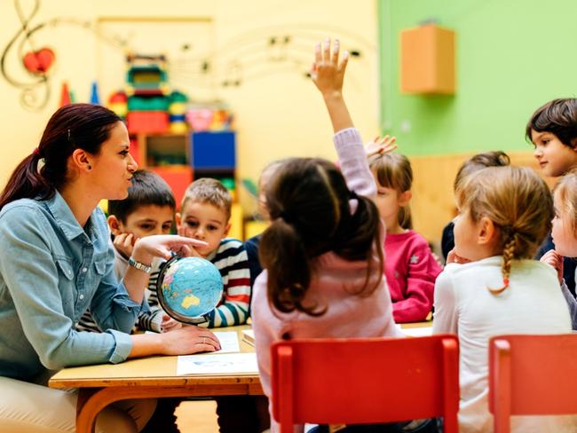 RendezView. Childcare teacher teaching her children about geography. (Pic: iStock)