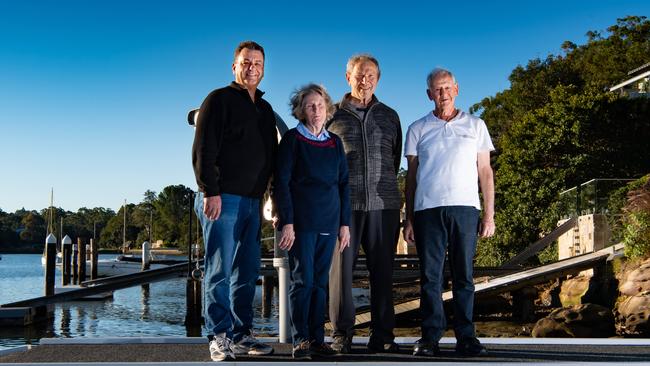 Gerry Manderson, Anne and Peter Massasso and Waterfront Action Group president George Citer on a private jetty near Glades Bay Park. Picture: Monique Harmer