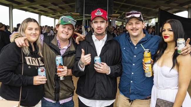 At the Clifton Jockey Club Clifton Cup races are (from left) Tayla Otto, Kurtis Swan, Marvin Meek, Kobe McDermott and Whyley McDermott, Saturday, October 22, 2022. Picture: Kevin Farmer