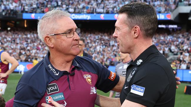 MELBOURNE, AUSTRALIA - SEPTEMBER 30: Lions coach Chris Fagan is acknowledged by Magpies coach Craig McRae during the 2023 AFL Grand Final match between Collingwood Magpies and Brisbane Lions at Melbourne Cricket Ground, on September 30, 2023, in Melbourne, Australia. (Photo by Robert Cianflone/AFL Photos/via Getty Images)