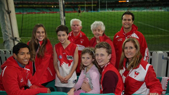 Nathan Harapin, Andi Illidge, Edyn Harapin, Kenny Williams, Kaiya Harapin, Yvonne Williams, Tyler Harapin, Paul Harapin and Diane Harapin at the Swans V Hawthorn match at the SCG. The family is observing self isolation and cannot see their beloved Swans.