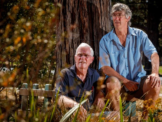 Black Saturday Kinglake community response coordinators Ivan Peterson and Larry Challis, reflect in the Whittlesea community gardens this week. 