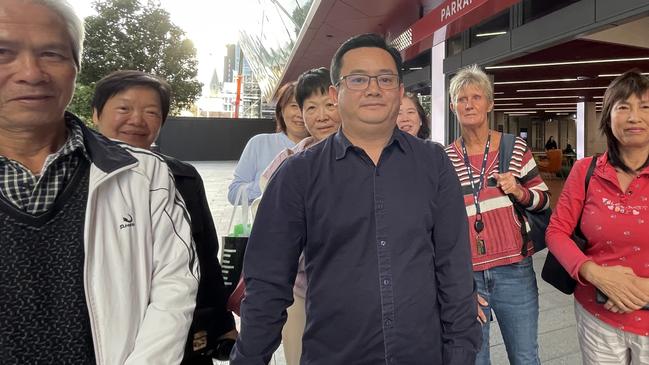 Parramatta residents after the planning panel meeting. Front row: Barry Ling, Kevin Wu and Lena Tan (red jumper and white pants). Behind them are Iao Kam Wong, Li Li Meng (light blue shirt) Wei Shen, Zhang Minghua and Tracey Dennett.