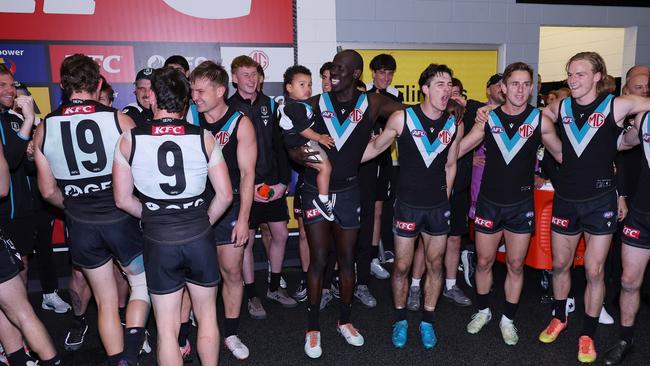 The Power celebrate after keeping their premiership hopes alive. (Photo by James Elsby/AFL Photos via Getty Images)