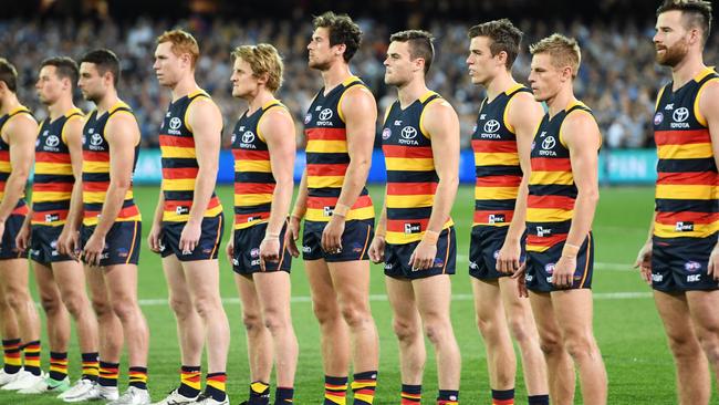 The Crows line up for the national anthem. Picture: AAP Images