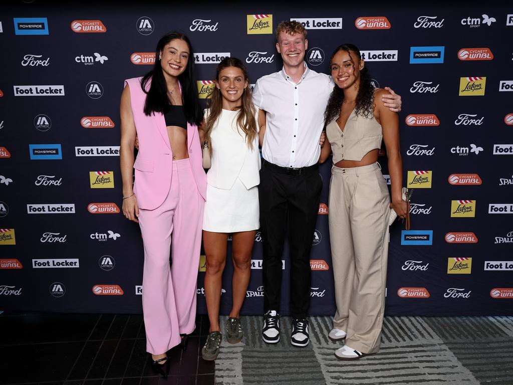 The Flames’ Emma Clarke, Isabella Brancatisano and Celeste Taylor. Photo by Graham Denholm/Getty Images for WNBL