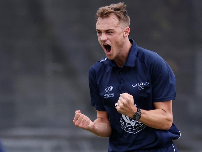 Xavier Crone of Carlton celebrates the wicket of Swans skipper Michael Wallace. Picture: George Sal