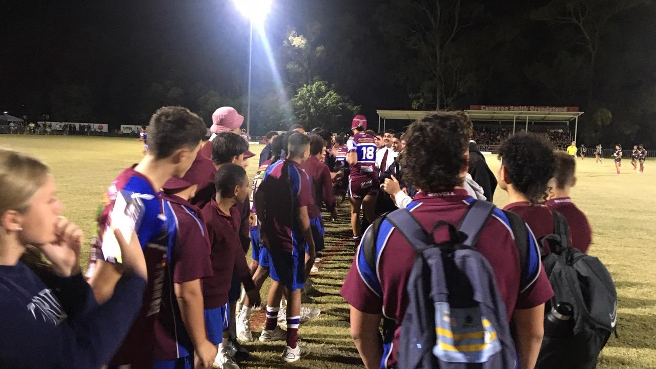 Wavell players run through a tunnel.