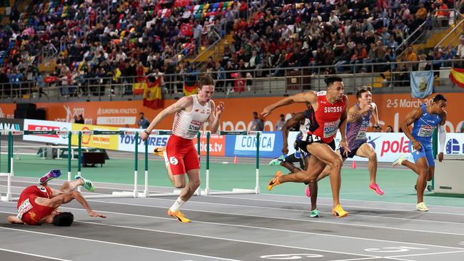 Jason Joseph wins as Enrique Llopis goes down hard. (Photo by Alex Livesey/Getty Images for European Athletics)