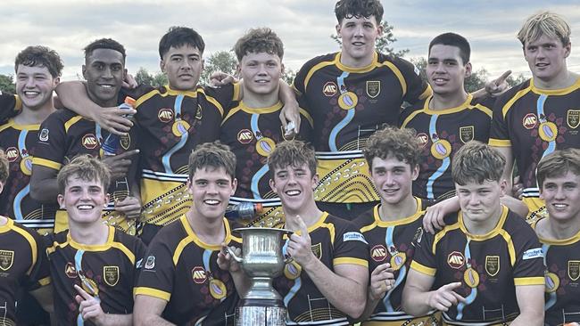 Padua College captain Will Tozer, front left, and Brock Dillon, right, with the premiership cup.