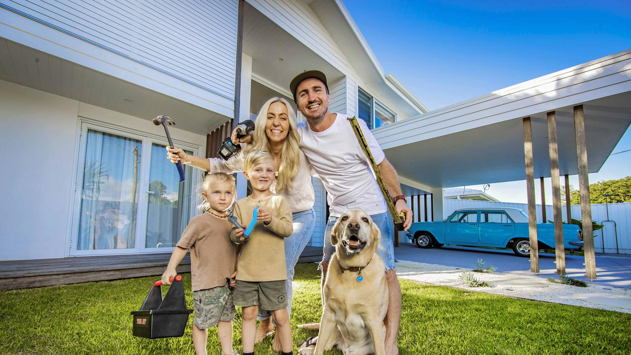 Kimberley and Kyle Bate, with their two sons, Lennox, 5, and Spencer, 2, have renovated fixer-uppers to sell in order to live mortgage-free without the stress of rising cost of living. Picture: NIGEL HALLETT