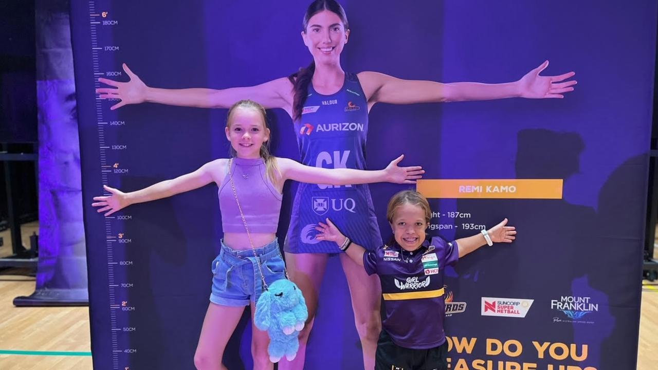 Mia Kertesz and a friend at the FireBirds game tested out their wingspan.