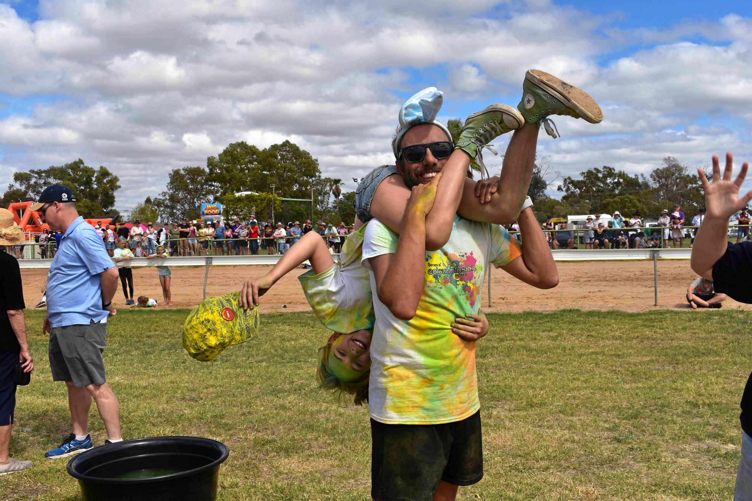 shown how to carry your wife correctly in wife carrying race