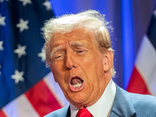 US President-elect Donald Trump gestures as he attends a meeting with House Republicans at the Hyatt Regency hotel in Washington, DC on November 13, 2024. (Photo by Allison ROBBERT / AFP)