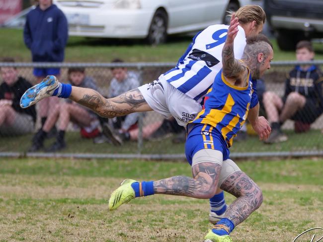 Somerville's Ryan Gillis and Langwarrin's Shane Paterson battle for the ball. Picture Paul Stanley Churcher