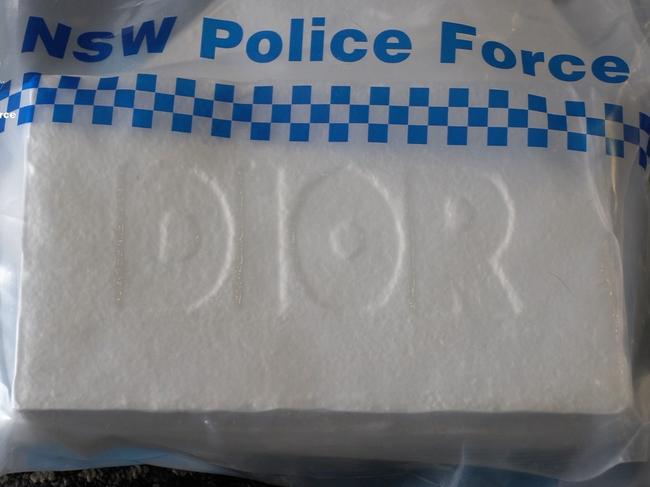 Police seized blocks of cocaine stamped with Dior in raids around Sydney.