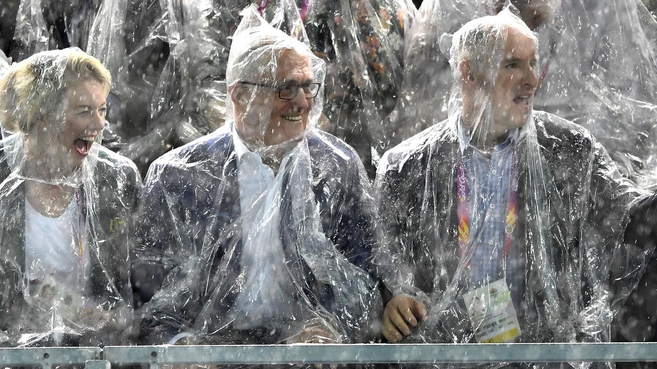 The rain doesn’t stop the prime ministers enjoyment of a golden night in the pool.